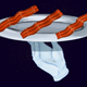 Illustration for article titled How To Serve Bacon So Your Fancy Friends Will Like Item/em